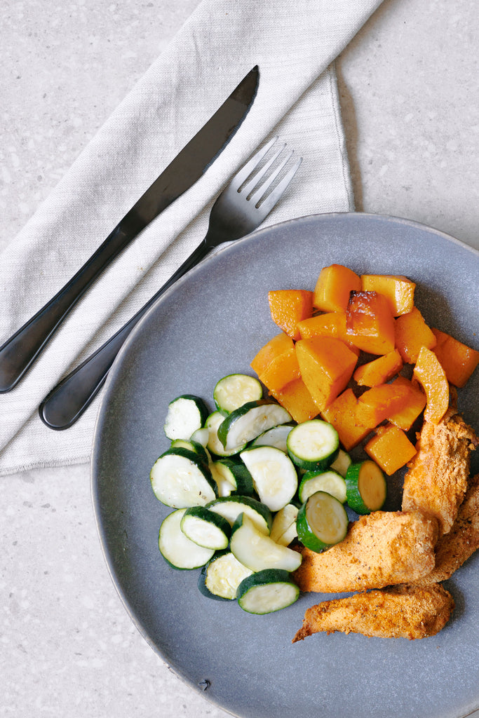 Crumbed Chicken Breast Tenders with Roasted Zucchini and Butternut